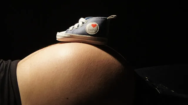 arm mom dad tattoo