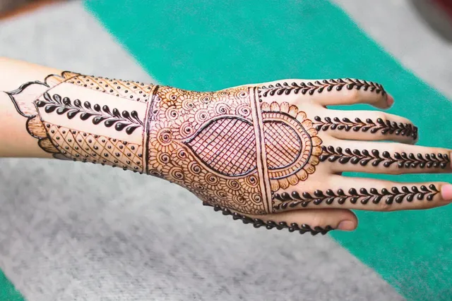 back side modern full hand mehndi design 1