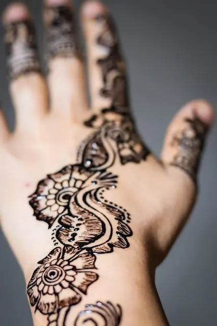 unique royal front hand mehndi design 1
