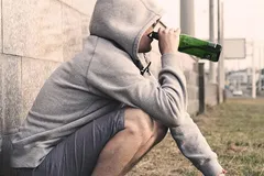 sad-guy-smoking-drinking-alone_94347-225-min